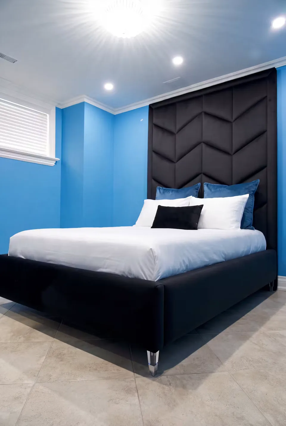 Angled view of the dark padded frame and stacked chevron panels