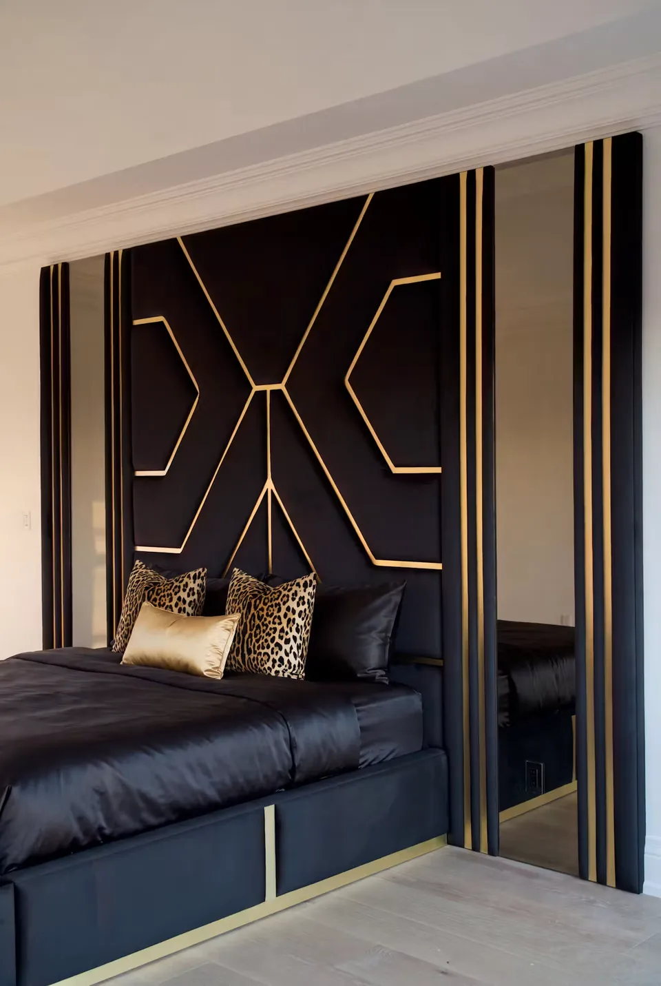 Angled view of the black panels and reflected room in the mirror