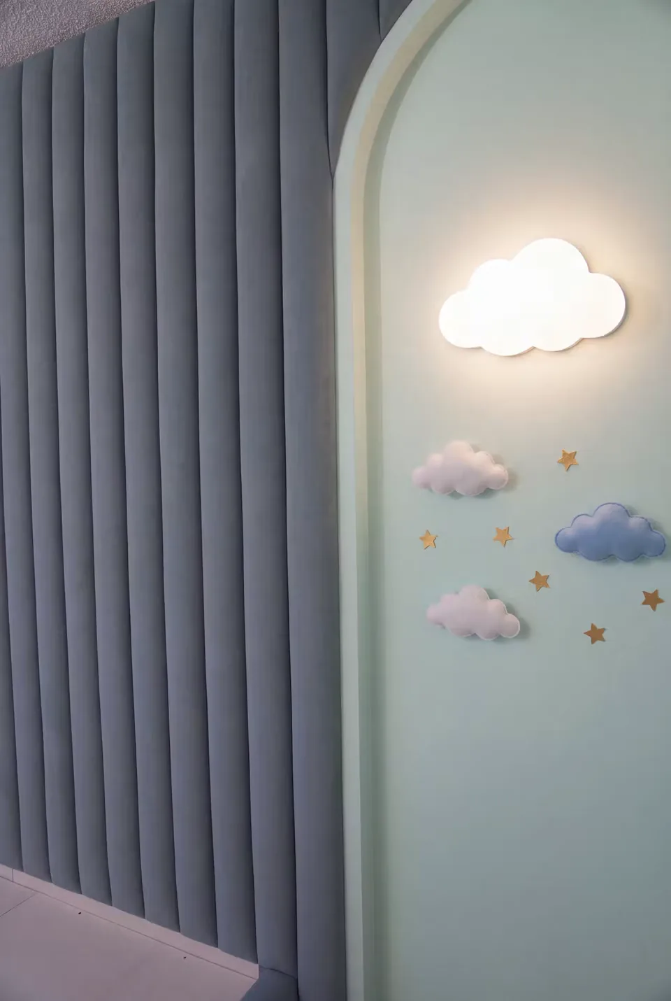 Detail of the illuminated cloud and small decorative clouds in the alcove