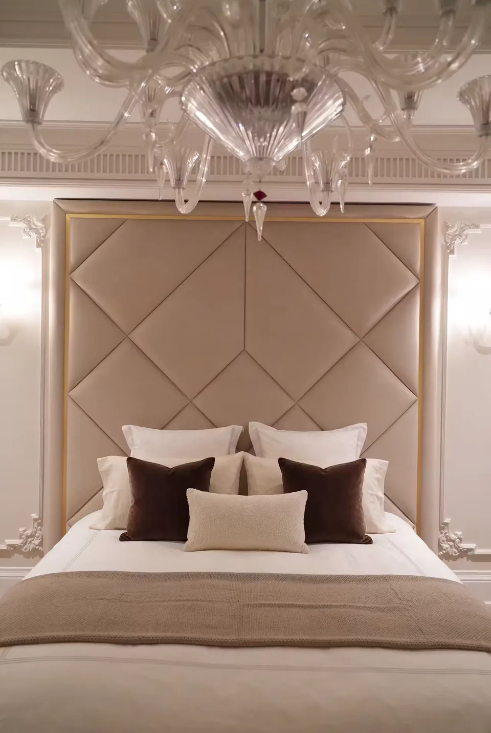 Front view of the champagne diamond headboard with a narrow gold-toned border