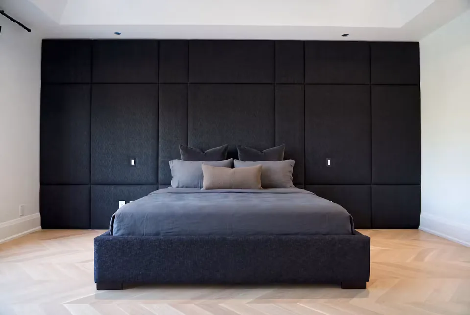 Full front view of the charcoal bed beneath a broad square panel grid