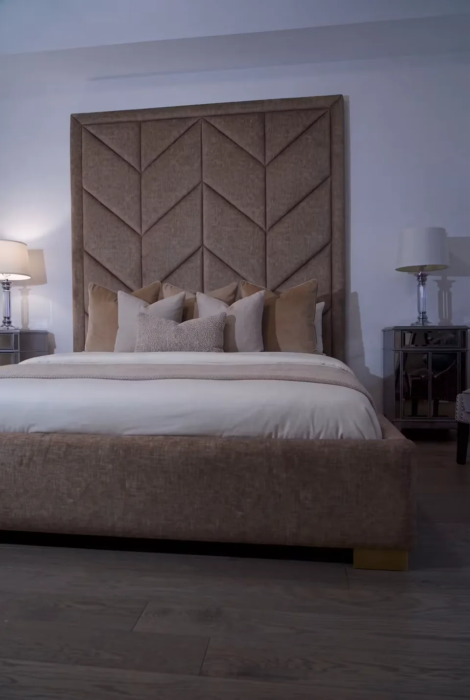 Full front view of the cocoa bed and padded geometric headboard