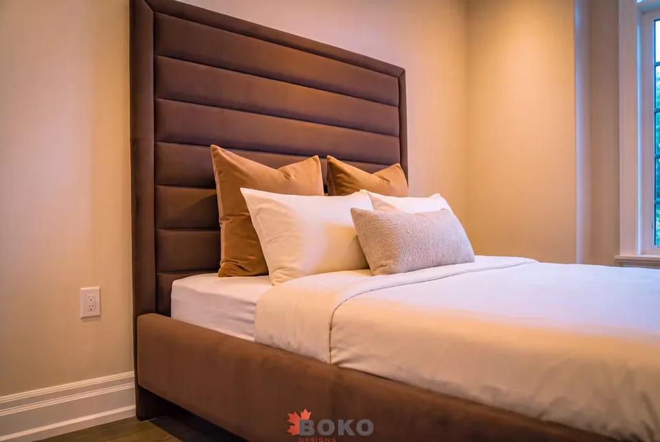 Angled detail of the horizontal padded headboard and matching frame