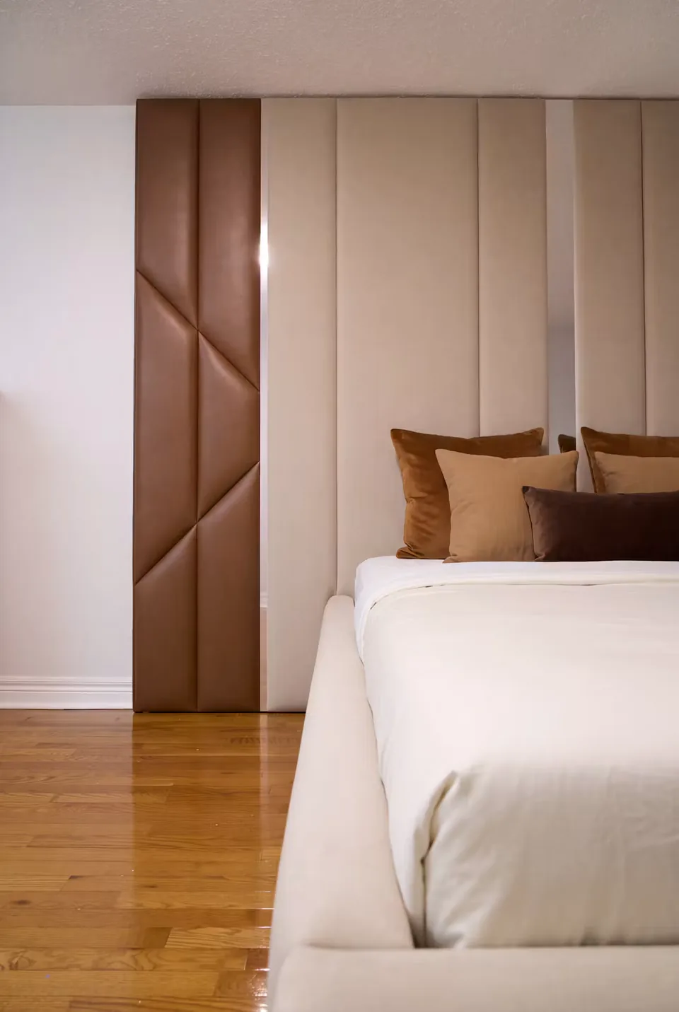 Detail of the cream columns and warm brown cushions