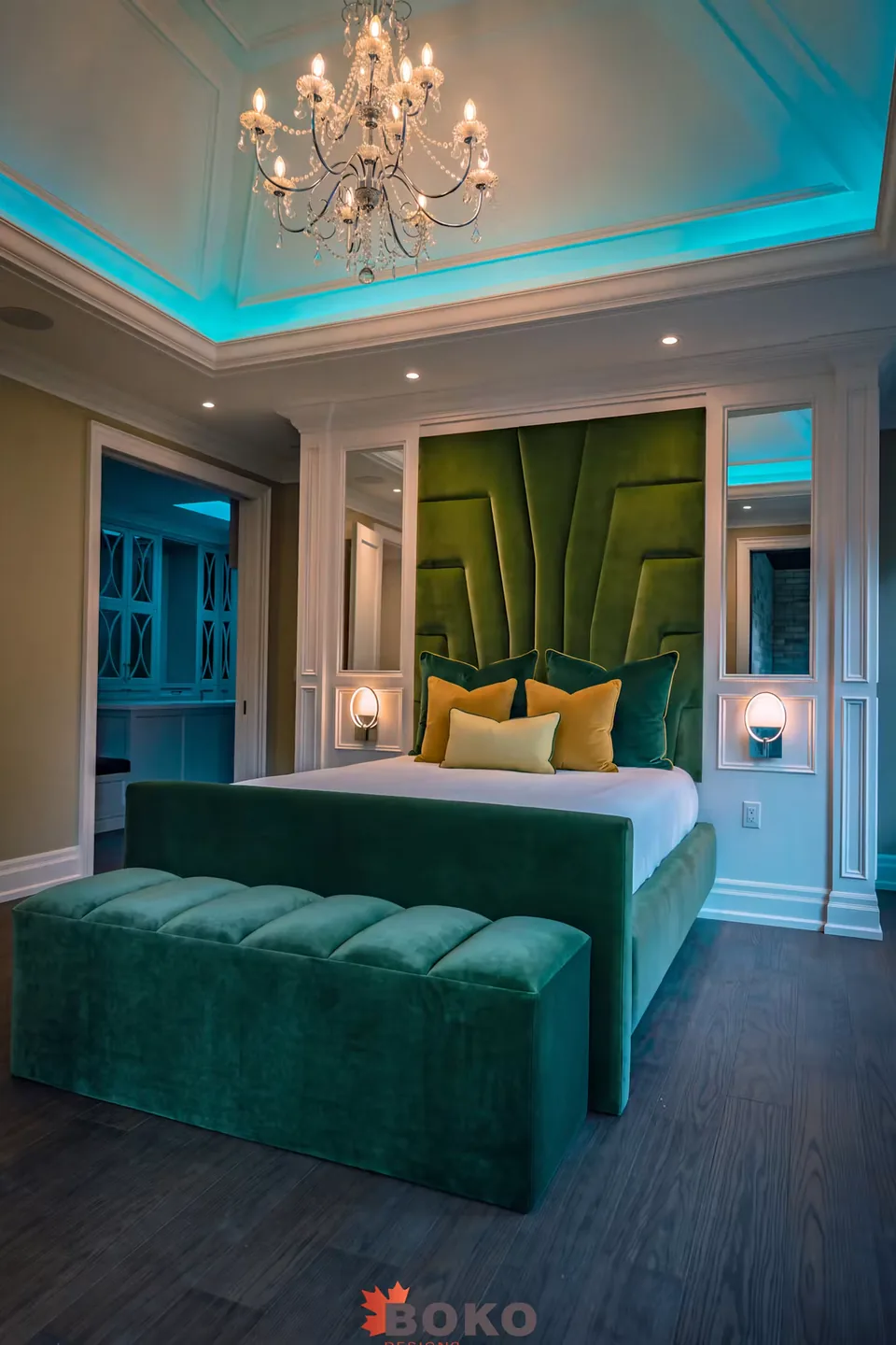 Full view of the emerald bed, geometric headboard and matching bench