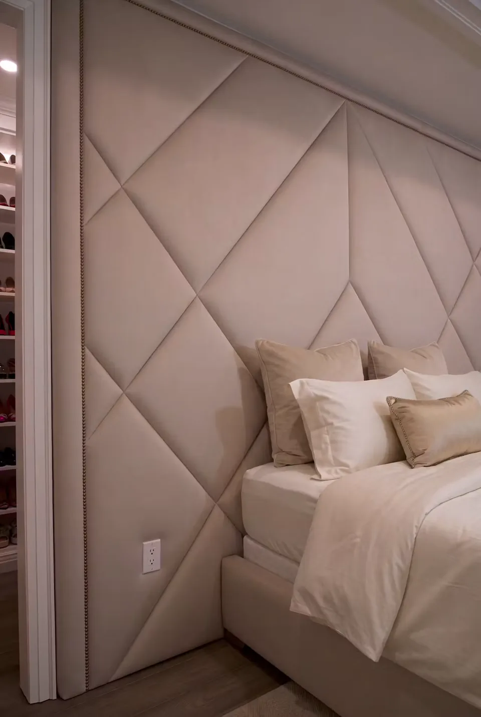 Close view of the diamond seams beside the bed