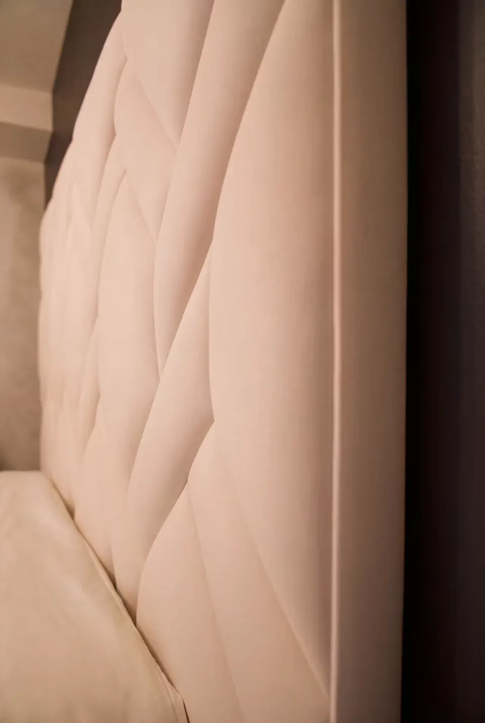 Close detail of the ivory padded diagonal seams