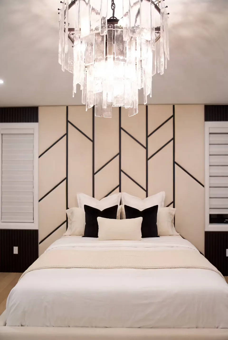 Front view of the pale bed and branching black headboard lines