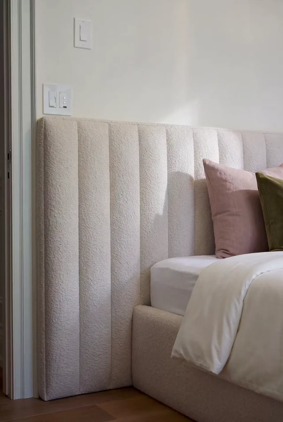 Detail of the ivory padded columns beside the pillows