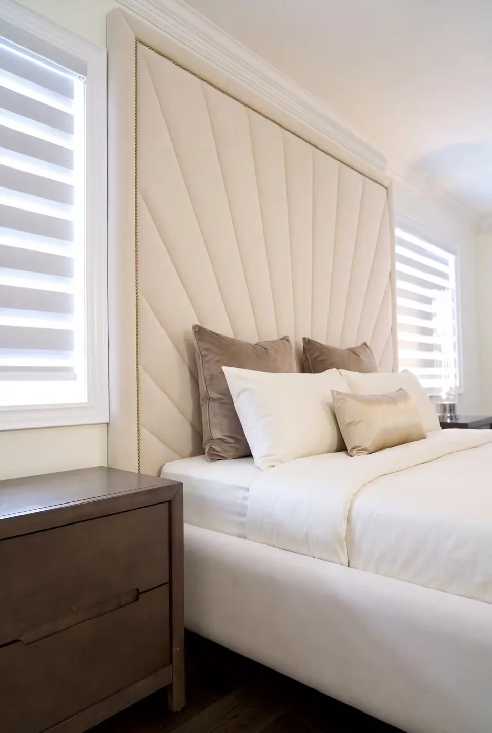 Side view of the padded headboard and matching bed frame