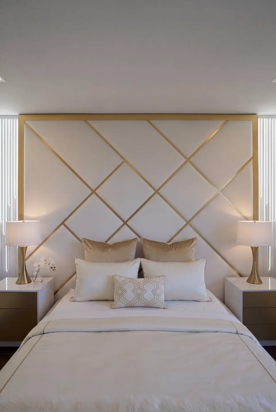 Closer front view of the crossed gold-toned headboard lines