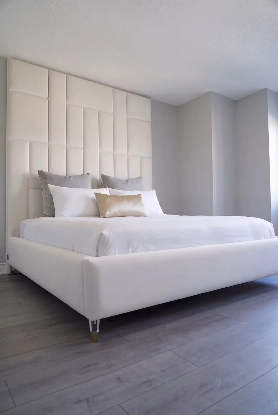 Angled view of the ivory frame and irregular padded tile grid