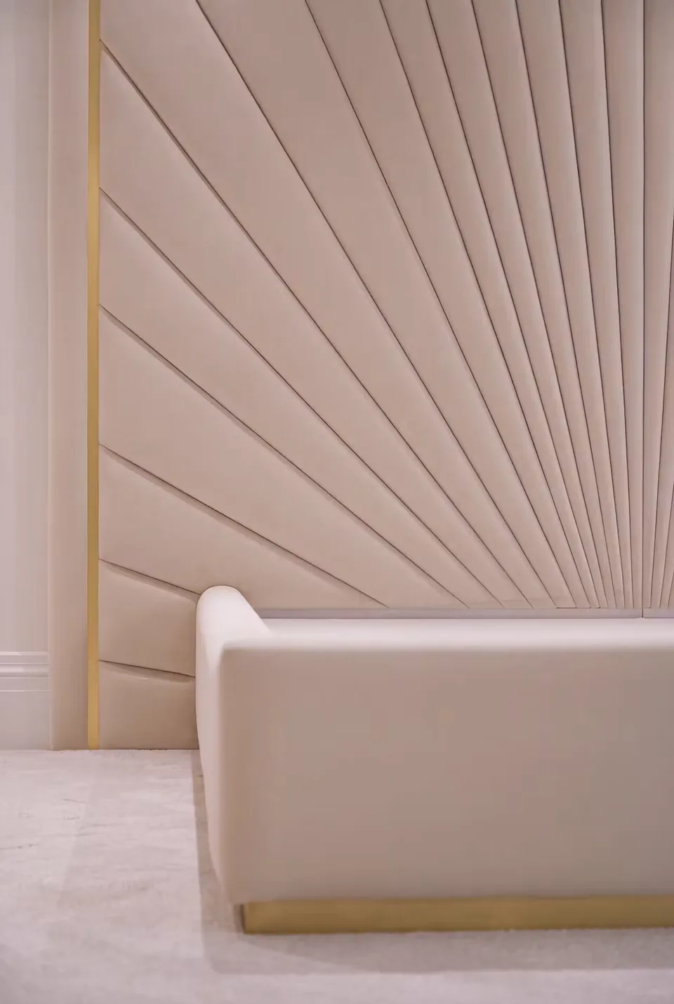 Close view of the ivory rays near the bed's upper edge
