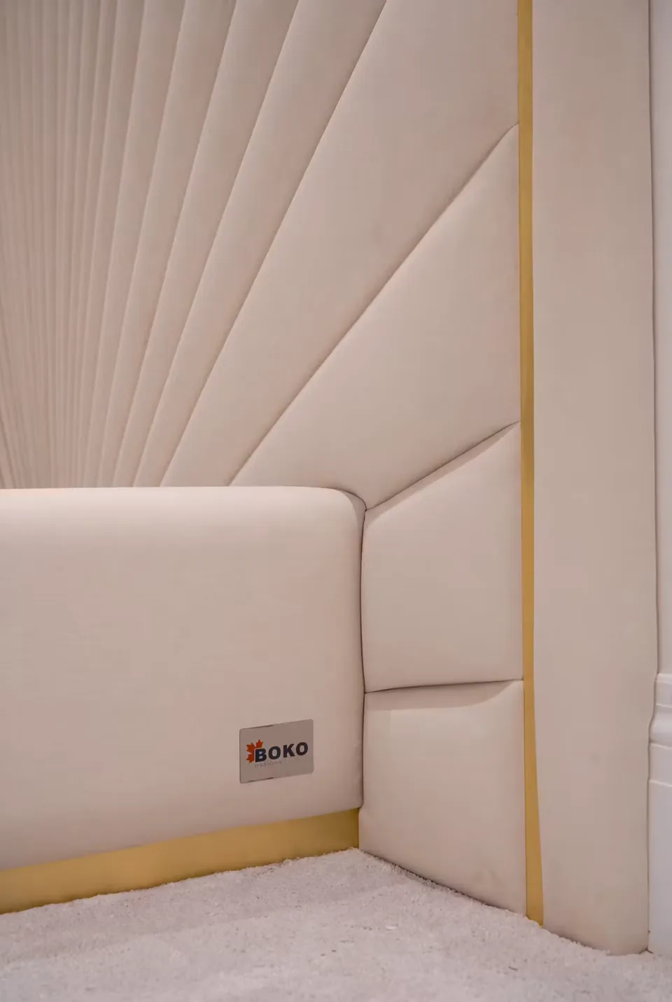Detail of the ivory upholstered frame and BOKO label