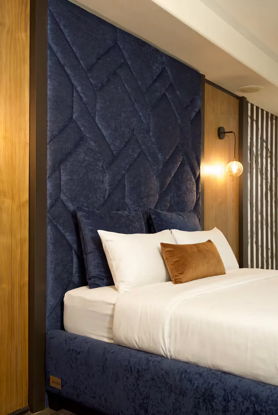 Close view of the textured navy geometric upholstery