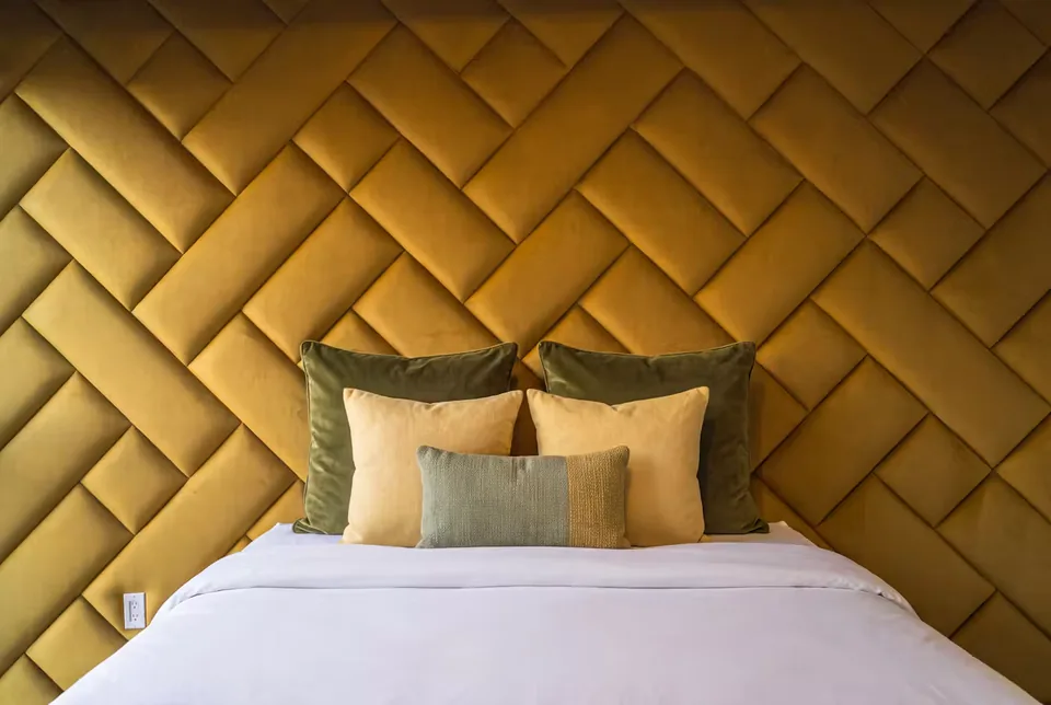 Front detail of the ochre interlocking headboard panels