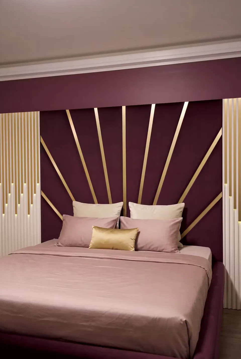 Close view of gold rays spreading behind the pillows