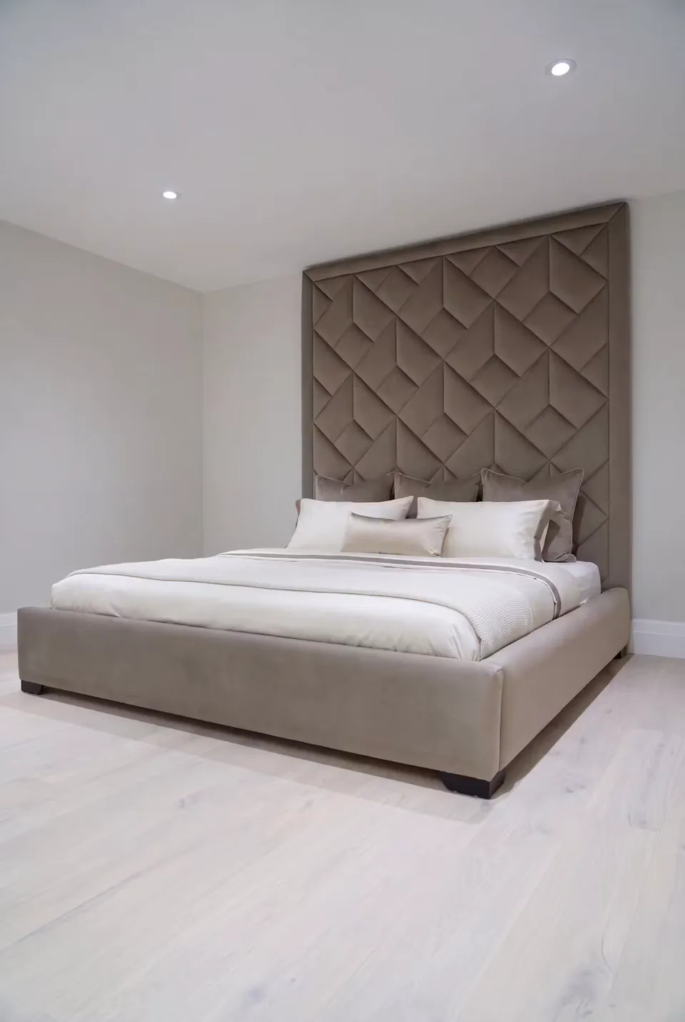 Wide view of the matching taupe frame beside a white window