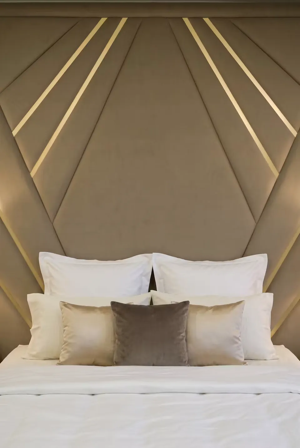Front detail of the padded taupe fan pattern and gold diagonal lines.