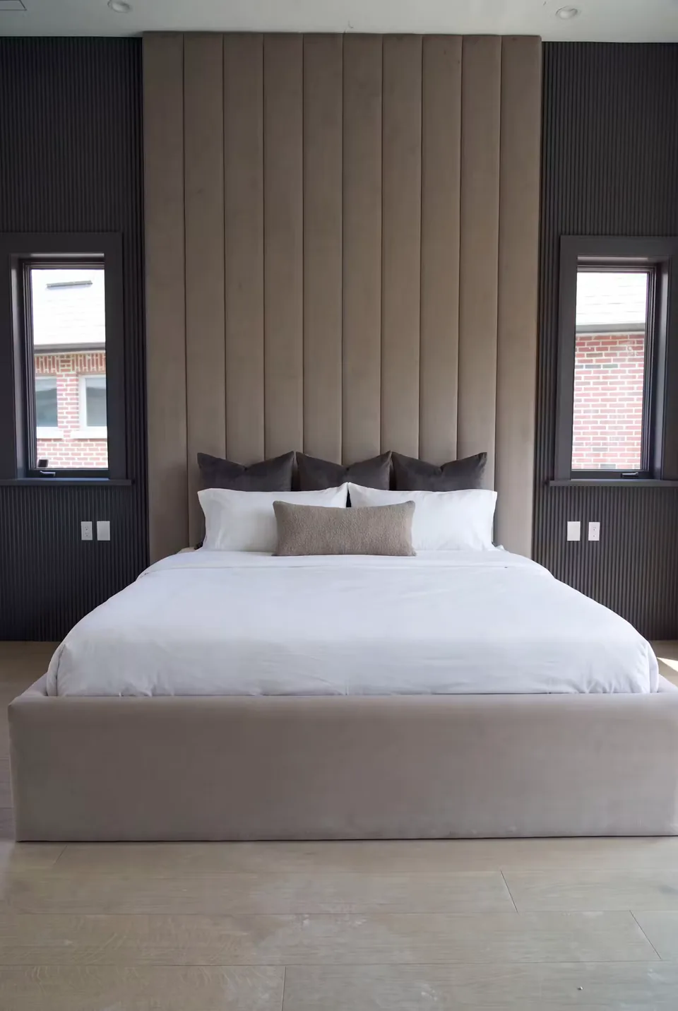 Front view of the broad vertical upholstery and dark window surrounds