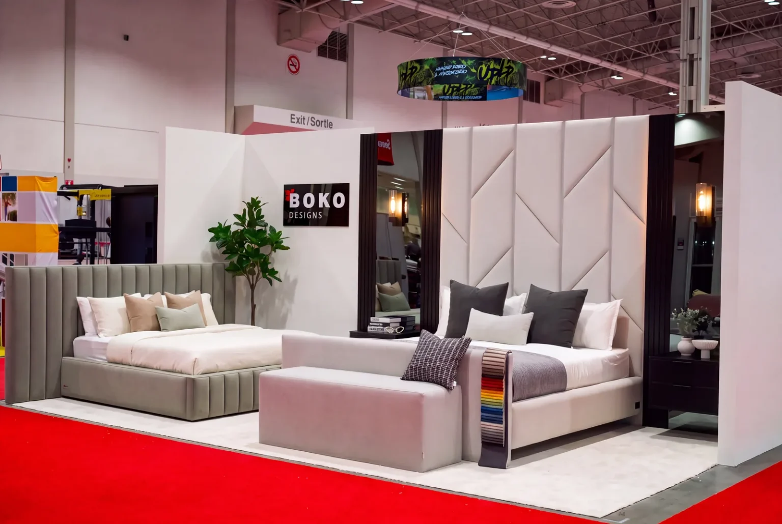 BOKO Designs booth 3517 at the National Home Show Toronto 2026 with the Max bed and a custom king headboard wall